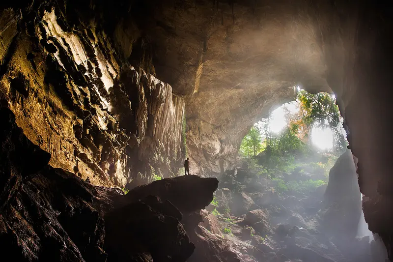 Climbing through a cave