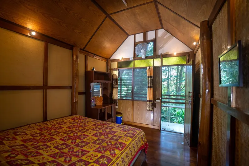 Timber bungalow with a double bed