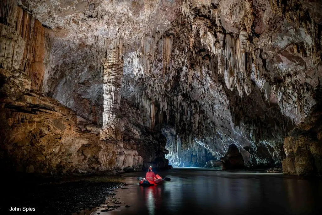 Kayaking through Tham Lod cave